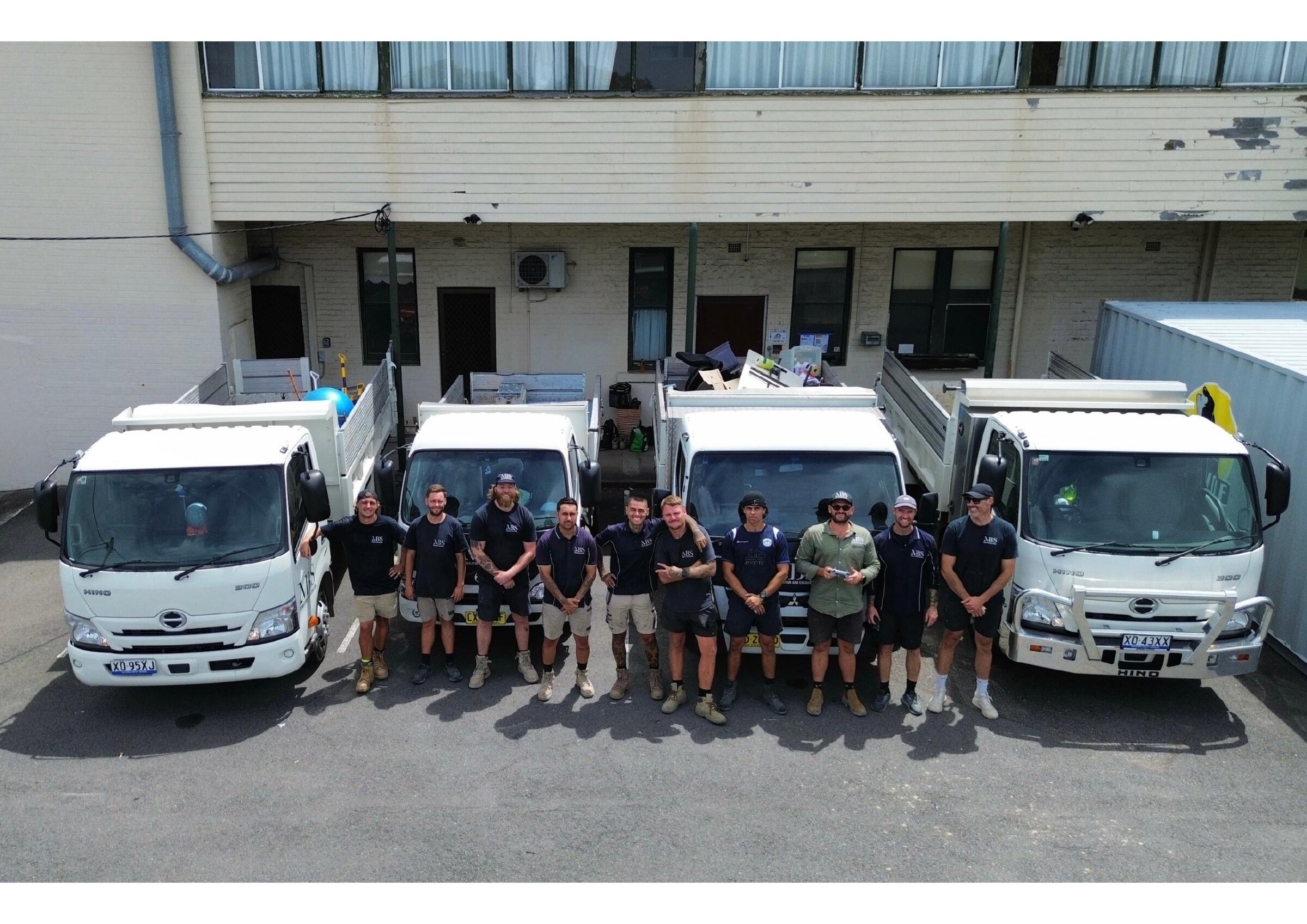 The MBS Demolition team and four-truck Hino fleet at the Northmead depot